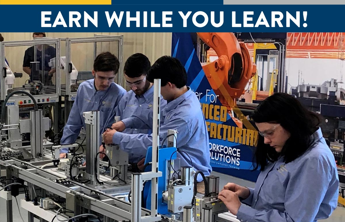 Earn While You Learn. Students working with robotics at Somerset Community College.