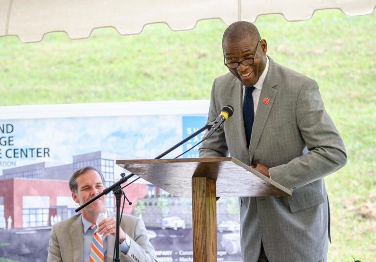 Man talking into a microphone