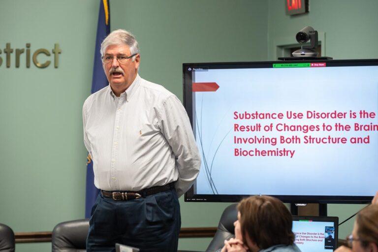 Man addressing a meeting