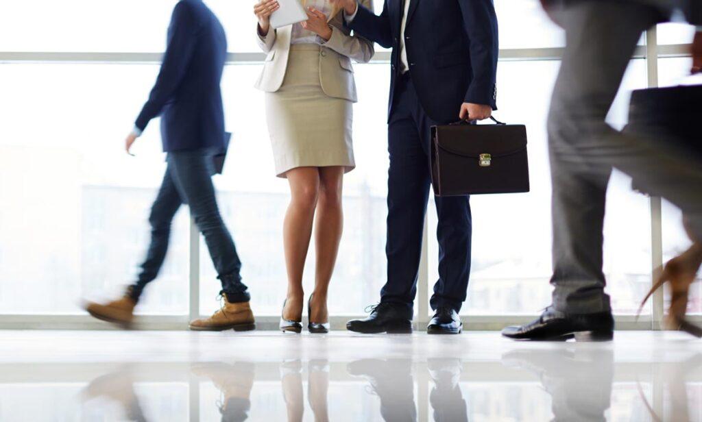 people walking in business setting