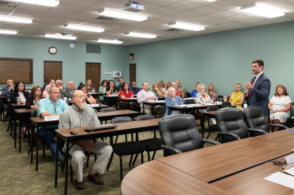 Sam Flynn addressing a group of people at the Cumberlands Workforce Development Board meeting.