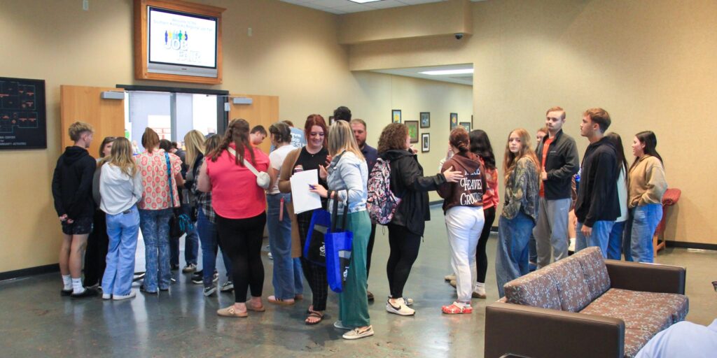 High school kids in line to enter job fair