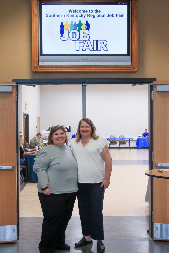 two people at the job fair entrance